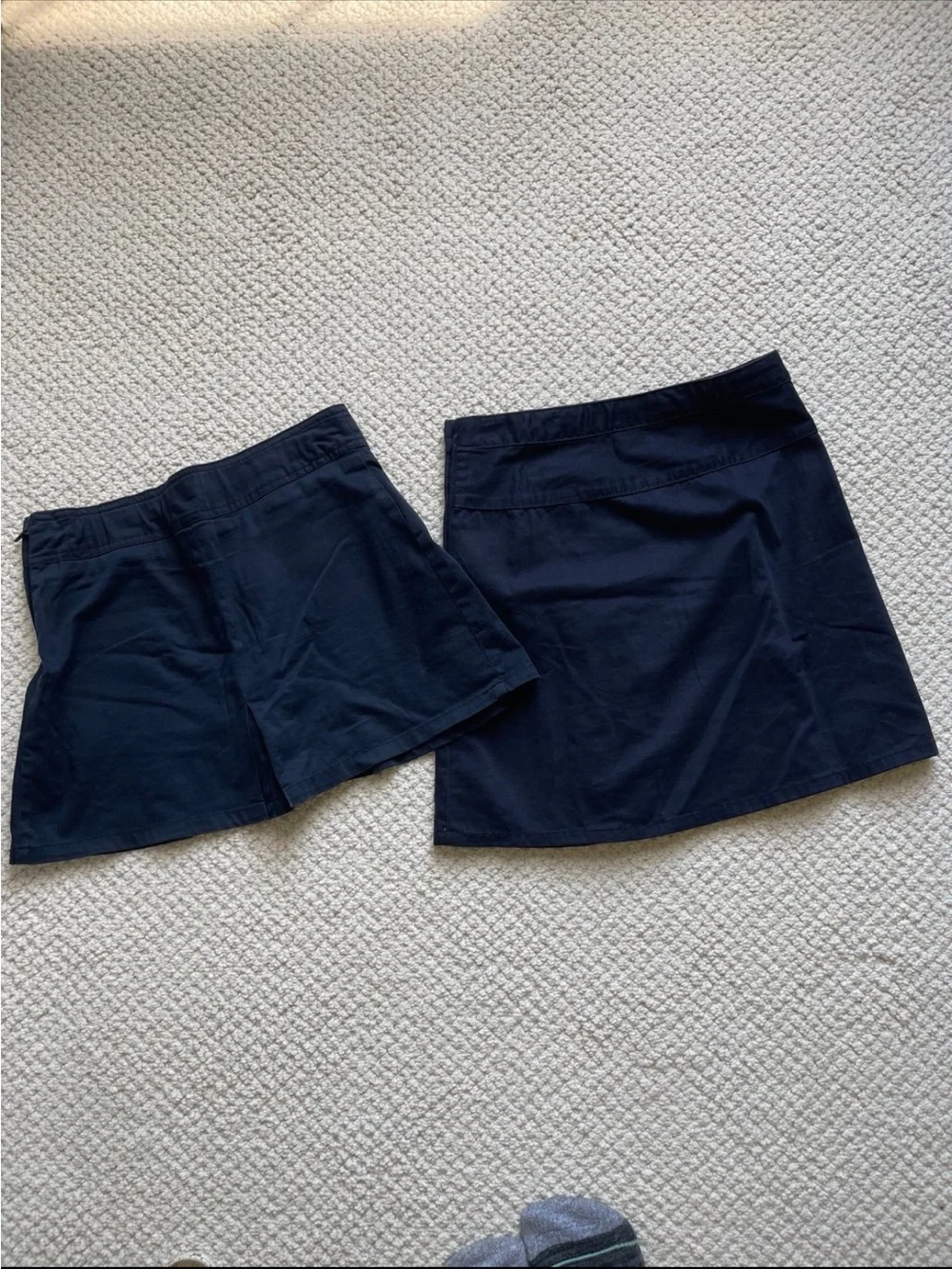 Two  skirts uniforms size 10